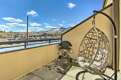 a swing on a balcony with a view of a highway at Near Coors Brewery and School of Mines Golden Unit in Golden
