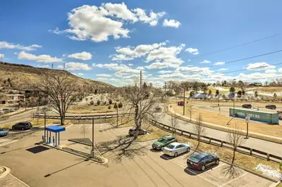 a street with cars parked in a parking lot at Near Coors Brewery and School of Mines Golden Unit in Golden