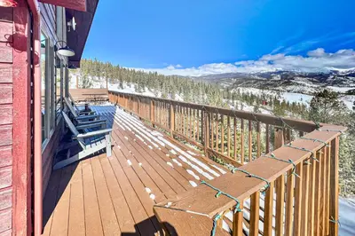 a balcony of a house with a view of the mountains at Rainbow Connection in Tabernash