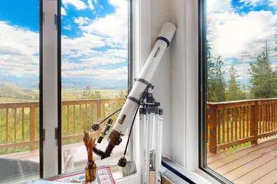 a rocket is hanging in a window at Rainbow Connection in Tabernash