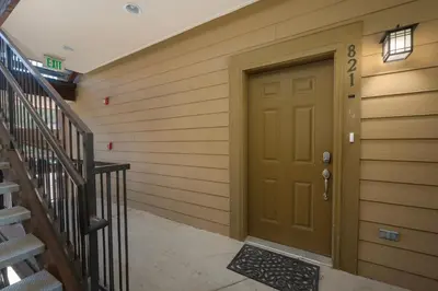 a door in a building with the number on it at Trailhead Lodges 821 in Winter Park