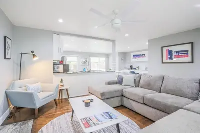 a living room with a couch and a chair at NEW Modern Home w/ Beautiful Finishes! in Denver