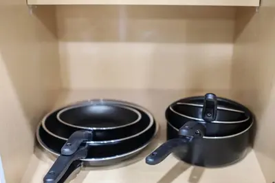 two pots and pans sitting inside of a drawer at NEW! Gorgeous Colorado Getaway * Glamping Vibes * in Denver