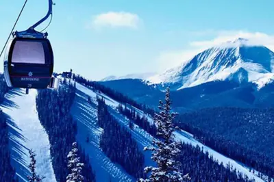 a ski lift going up a snow covered mountain at Sail Lofts at Lake Dillon 304 in Dillon