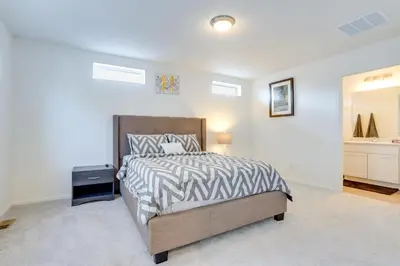 a bedroom with a bed with a zebra print bedspread at Near Hiking, Golfing and Fishing Colorado Retreat! in Henderson