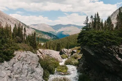 a view of a mountain valley with a river at Windwood Alpine Townhome: Downtown Frisco in Frisco