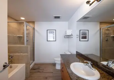 a bathroom with a sink and a shower and a toilet at Premium Unit 4575-Fraser Crossing Founders Pointe condo in Winter Park